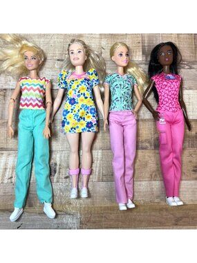 Barbie Dolls Assorted Set Of 4 With Colorful Outfits & Accessories Pre-Owned